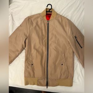 Brand new Beige bomber killion size small